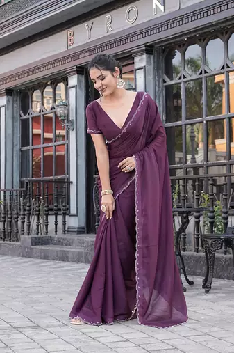 Silk blend wine solid embellished stone work sarees