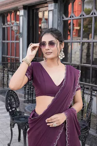 Silk blend wine solid embellished stone work sarees