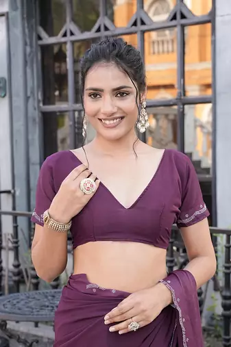 Silk blend wine solid embellished stone work sarees