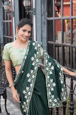 Silk blend green floral embroidered cut work sarees 4