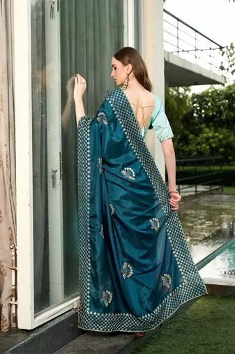 Silk blend teal floral zari cut-work  border sarees