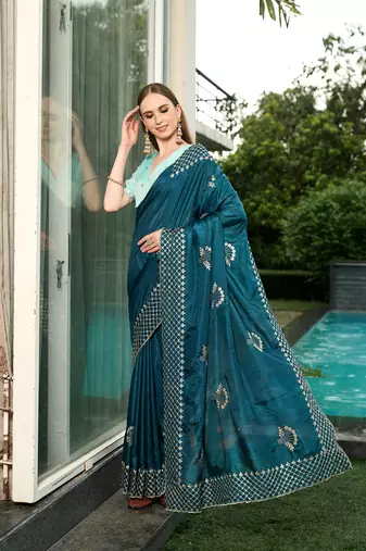 Silk blend teal floral zari cut-work  border sarees