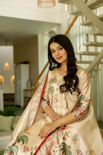 Beige color viscosee assam silk printed with beads kurta set with dupatta