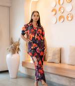 Buttoned-down bold floral cotton top