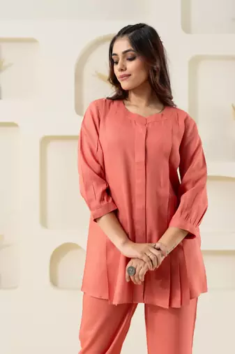 Peach pleated flared solid top