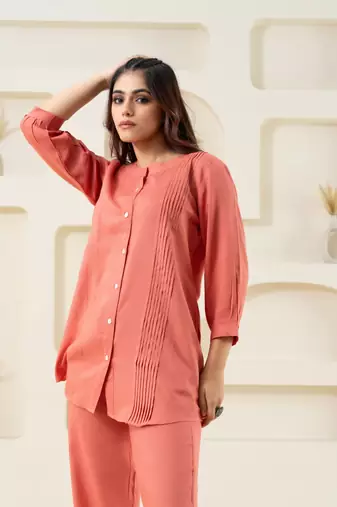 Peach pleated solid top