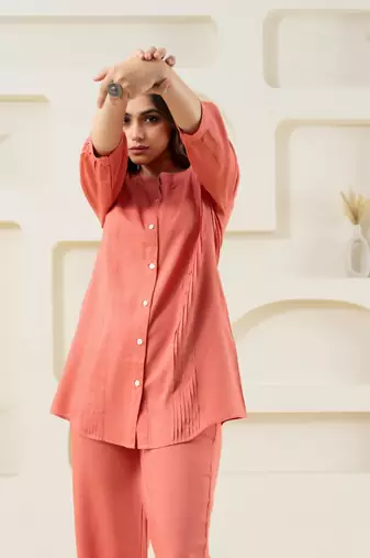 Peach pleated solid top