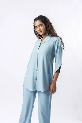 Light blue shawl collar shirt with curved sleeves