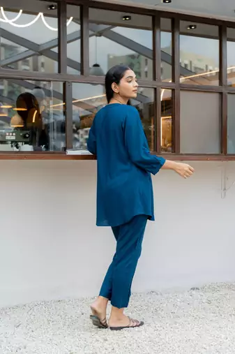 Sapphire front pleated flared top