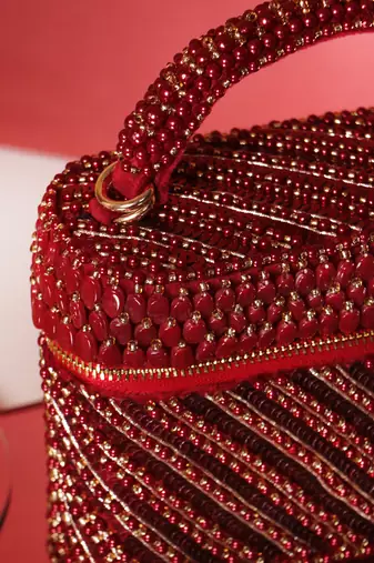 Red sequenced suede base cube bag