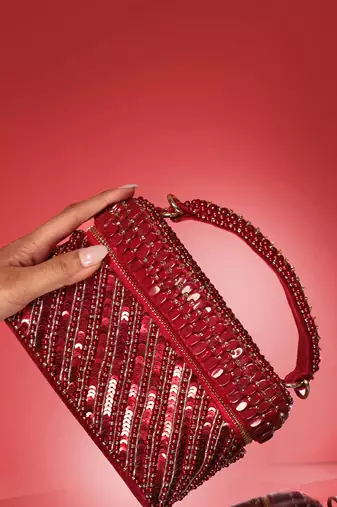 Red sequenced suede base cube bag