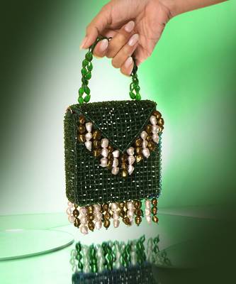 Semi velvet suede based green handbag with crystal bead work 1