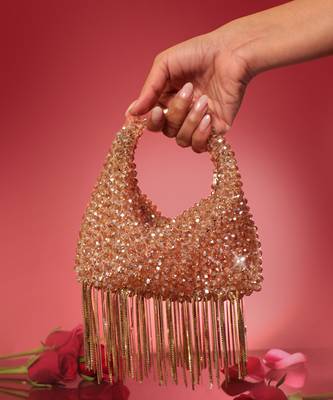 Gold potli bag with crystal work 1