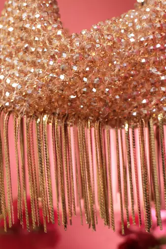 Gold potli bag with crystal work