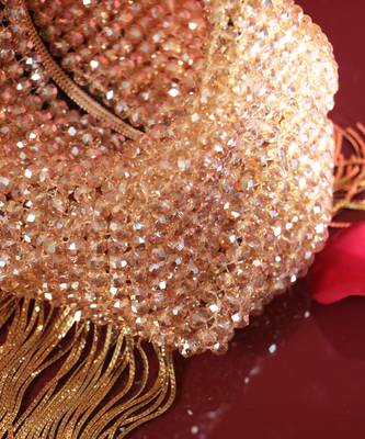 Gold potli bag with crystal work 4