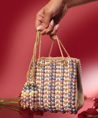 Multicolour suede based handbag adorned with intricate beadwork pearls 1