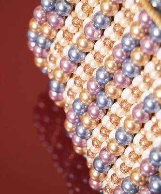 Multicolour suede based handbag adorned with intricate beadwork pearls 2