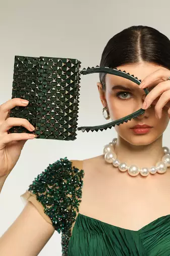 Green handfcrafted semi suede mini rivet bag