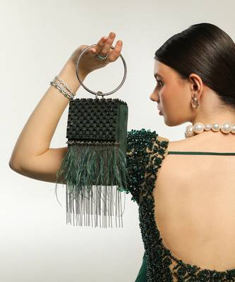 Green semi suede handbag with a gun metal chain 1