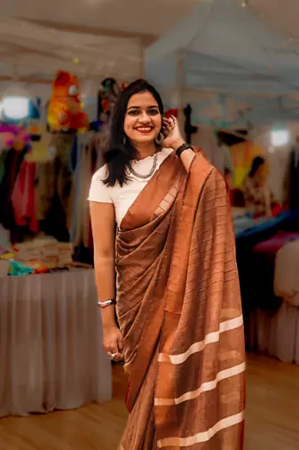 Brown kota viscose saree with unstitched blouse piece