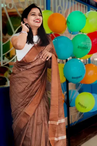 Brown kota viscose saree with unstitched blouse piece