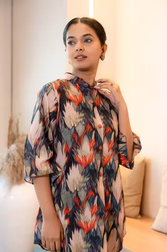 Half buttoned bold flared printed cotton top