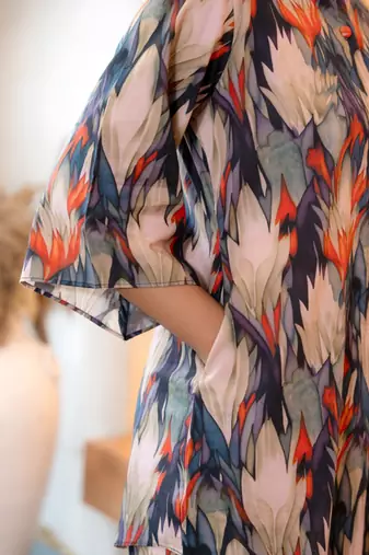 Half buttoned bold flared printed cotton top