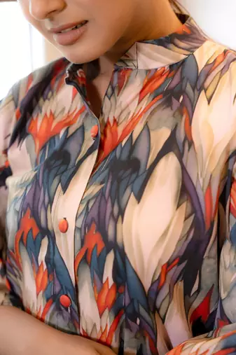 Half buttoned bold flared printed cotton top