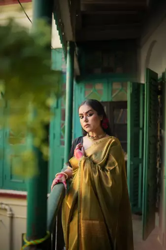 Green tissue linen saree with unstitched blouse piece