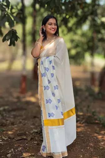 White tree motif kasavu cotton saree with unstitched blouse piece