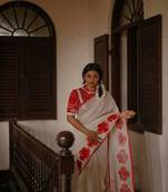 Cotton white embroidered red border cotton saree