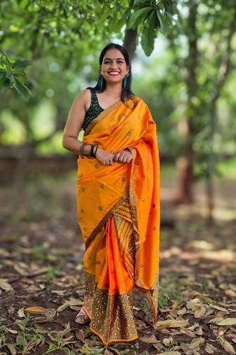 Yellow mekhela chador saree with unstitched blouse piece