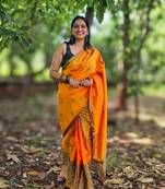 Yellow mekhela chador saree with unstitched blouse piece