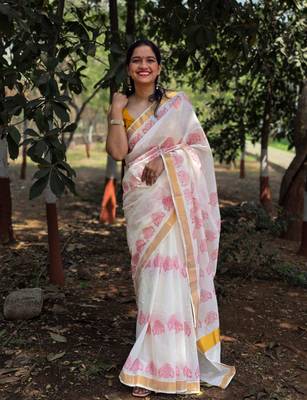 White dhol motif kasavu cotton saree with unstitched blouse piece 1