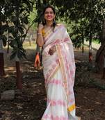 White dhol motif kasavu cotton saree with unstitched blouse piece
