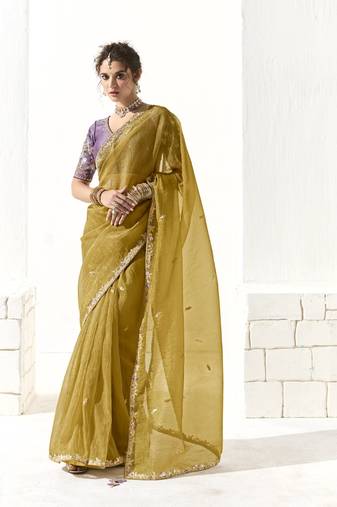 Mustard glass tissue saree with sequin zari weaving blouse