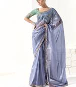 Light blue glass tissue saree with sequin zari weaving blouse