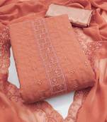 Peach unstitched suit with pink thread & mirror work embroidery