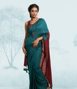 bottle green handloom cotton acrylic saree