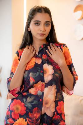 Half buttoned bold floral flared printed cotton top 4