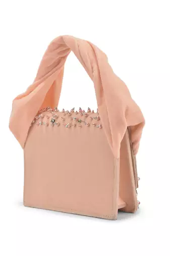 Pink velvet based stud hand bag