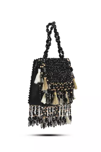 Black suede embroidered handbag with flowy detailing