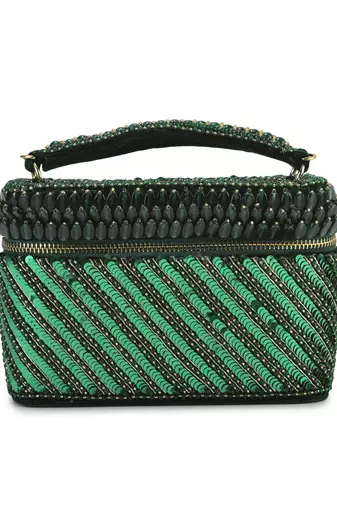 Green suede bag adorned with Bead Work