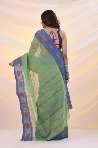 Green pure cotton tant saree with woven designs