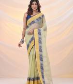 Lemon yellow pure cotton tant saree with woven designs