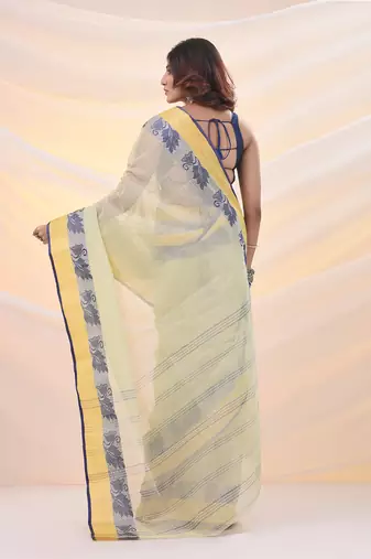 Lemon yellow pure cotton tant saree with woven designs