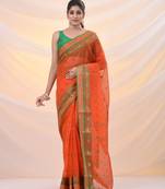 Orange pure cotton tant saree with woven designs