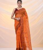 Orange pure cotton tant saree with woven designs