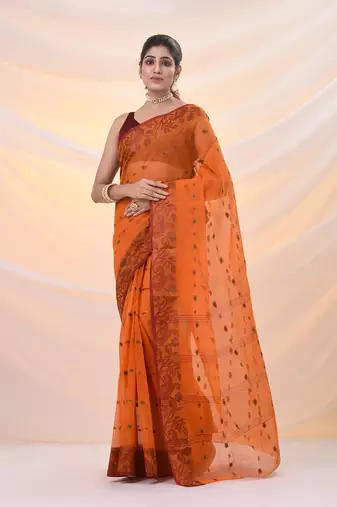 Orange pure cotton tant saree with woven designs