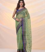 Pistachio green pure cotton tant saree with woven designs
